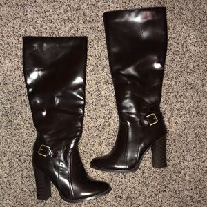 Knee high heeled boots